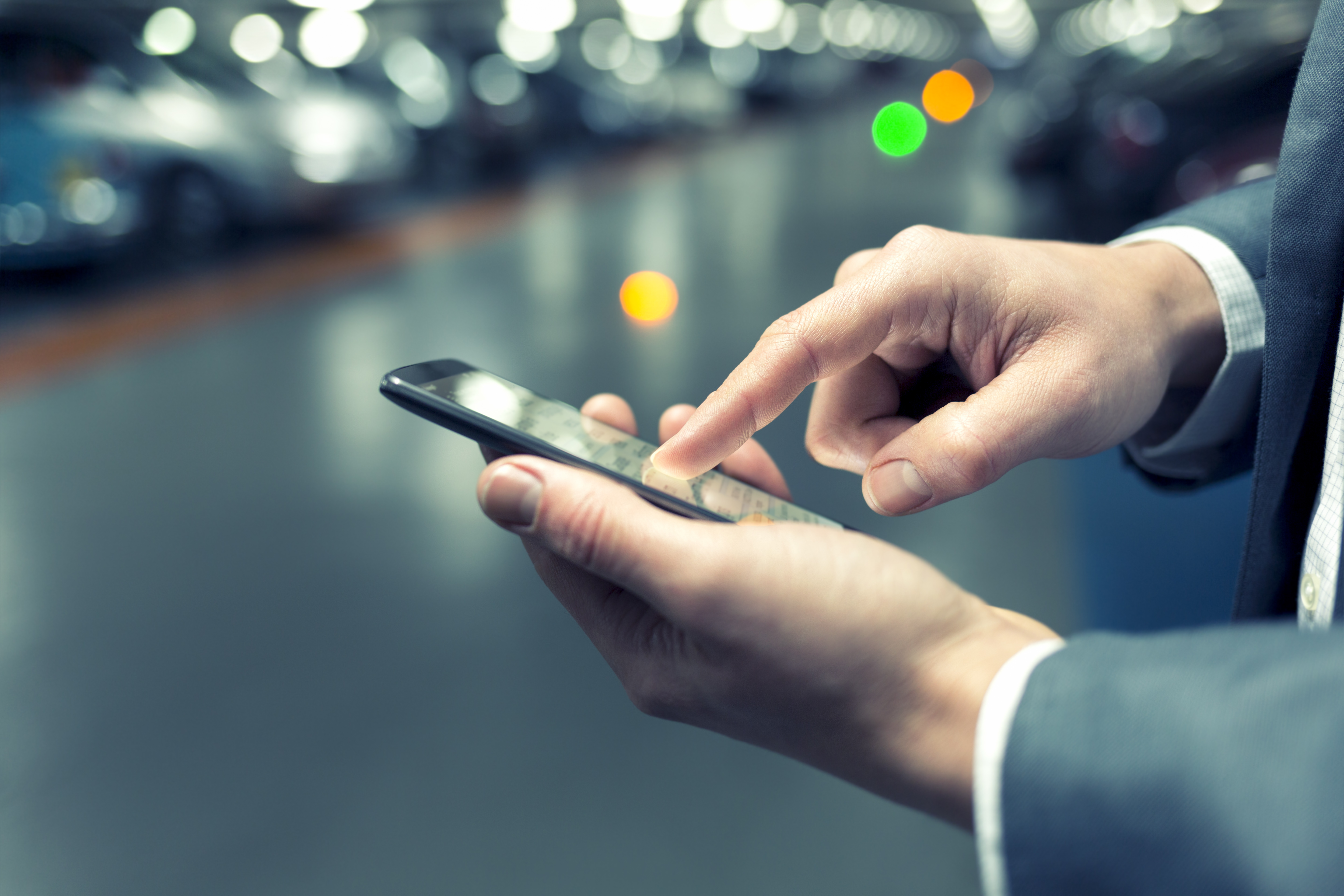 Man Receiving Robocall on Smartphone Man Receiving Robocall on Smartphone